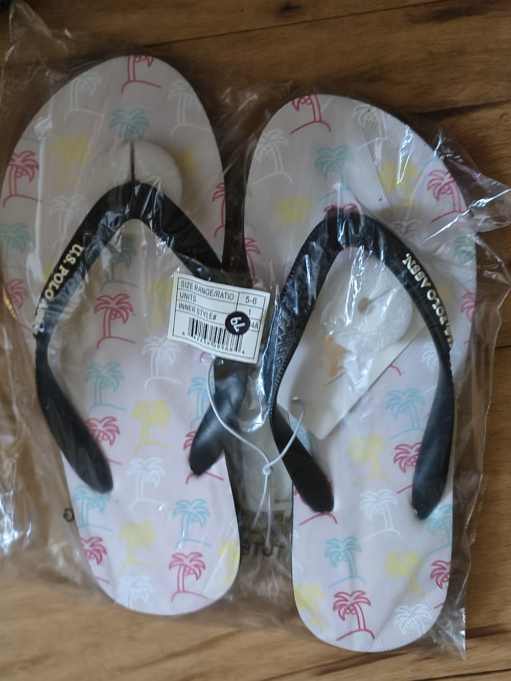 U.S. Polo AsWomen’s Tropical Palm Print Flip Flops - Black Straps, White Footbed